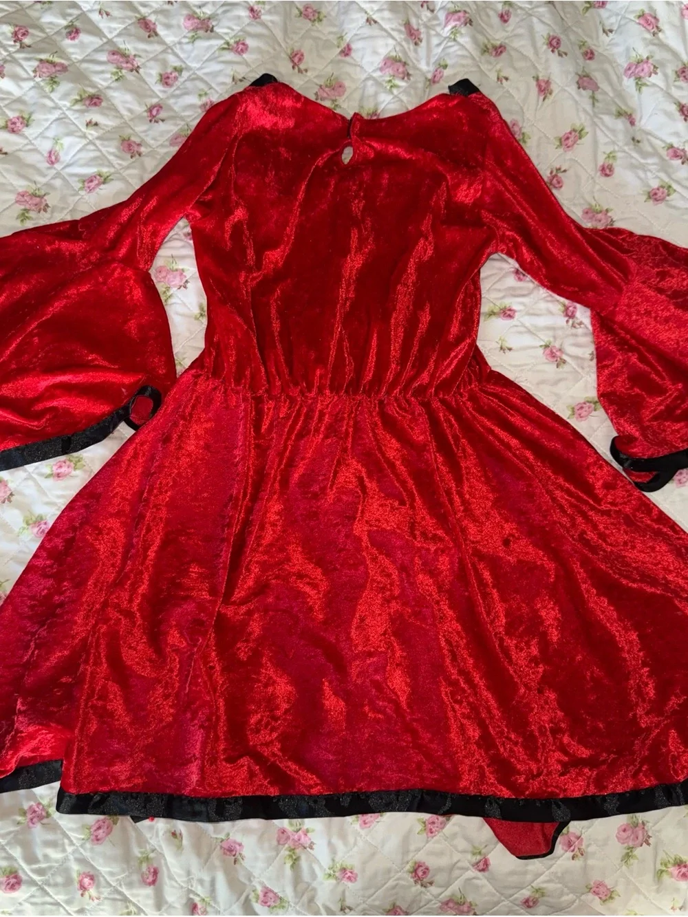 Red velvet dress with black trim and lace-up front, size L